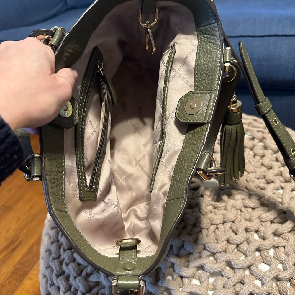 Olive green Michael Kors bag.